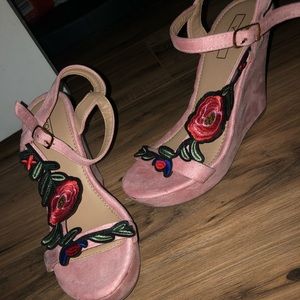 Pink suede heels embroidery detail